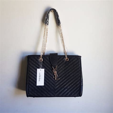 precio cartera yves saint laurent|cartera de santo laurent.